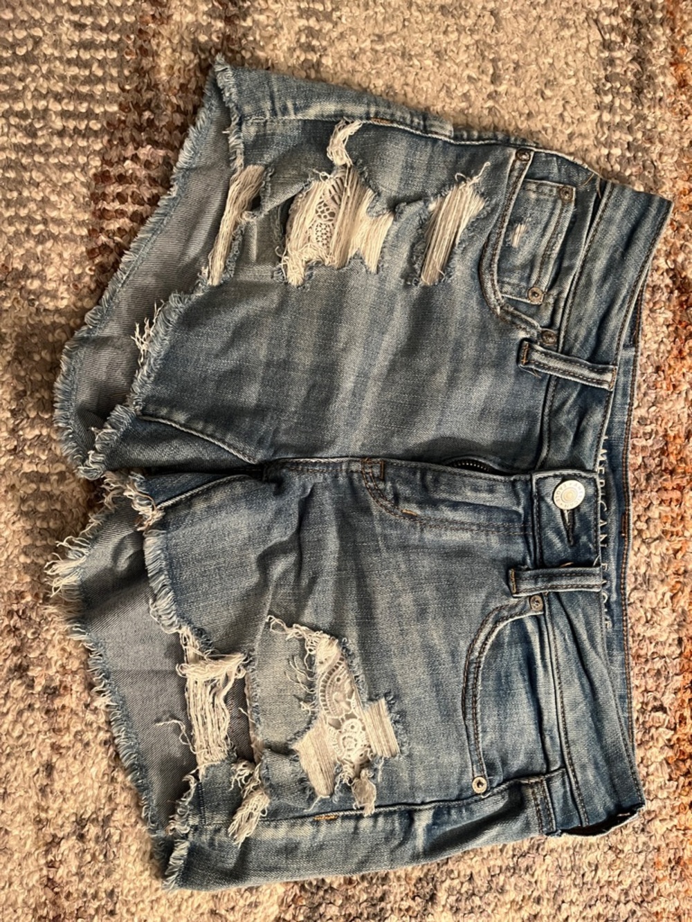 American Eagle Medium Blue Distressed Denim Shorts size 4